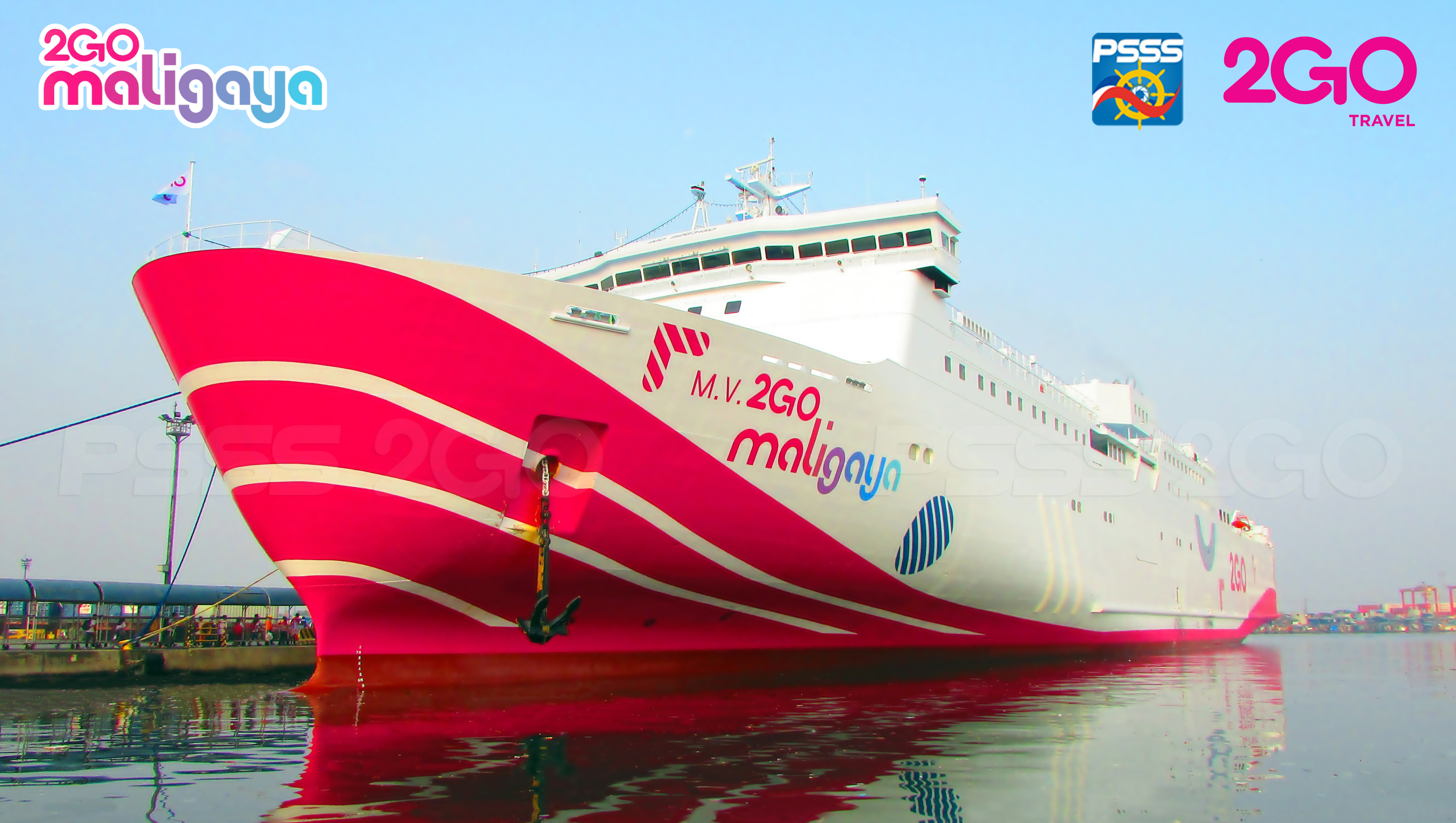 Freight containers being loaded at sunset